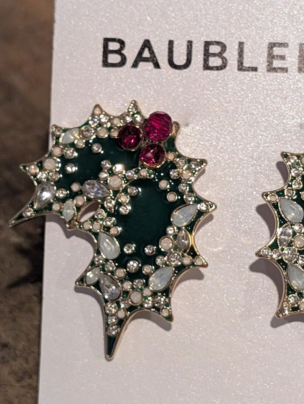 BaubleBar Dark Green Enamel and Ruby Crystal Holly Leaf Stud Earrings